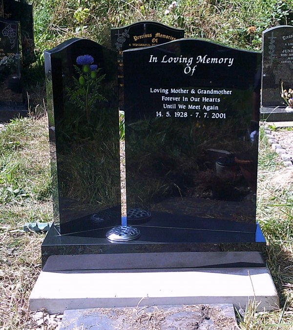 Highland memorial headstone with hand painted thistle