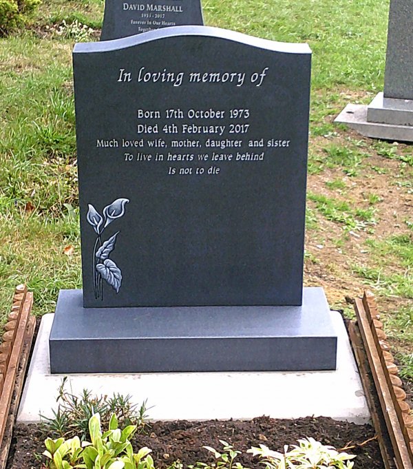 The Saddle honed memorial headstone with hand painted tulips