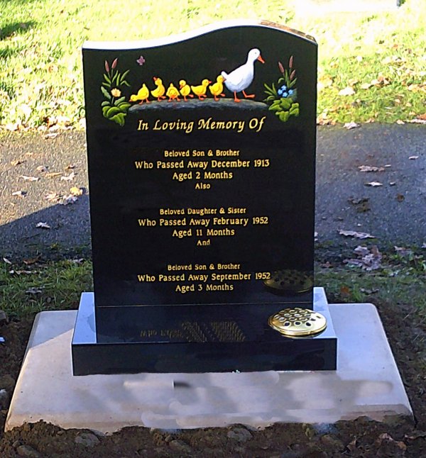 Half Ogee memorial headstone with hand painted ducklings and duck