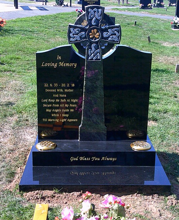 The shamrock memorial headstone with celtic cross and hand painting