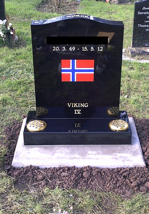 The Saddle with hand painted flag memorial headstone