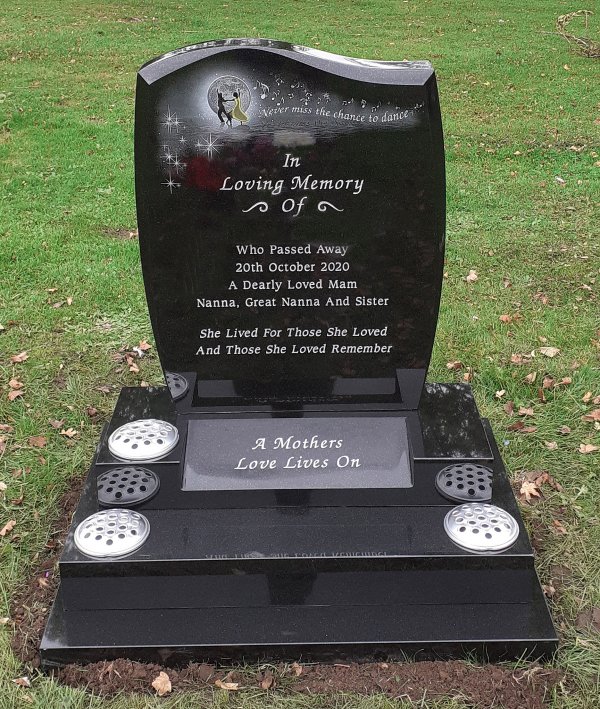 The Avon memorial headstone with dancing laser etching