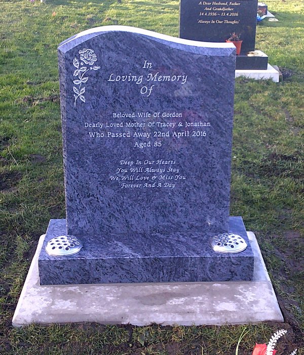 The devon memorial headstone with carved roses