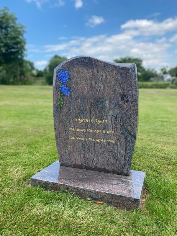 The Avon memorial headstone with hand painted agapanthus flower